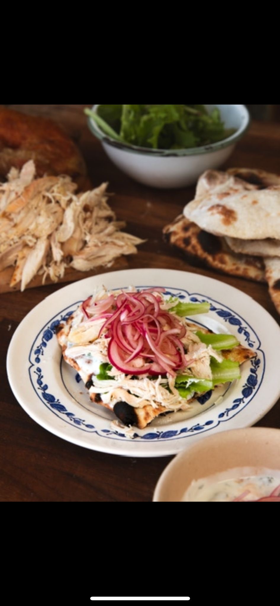 Chicken Piadina with garlic yogurt and red onions